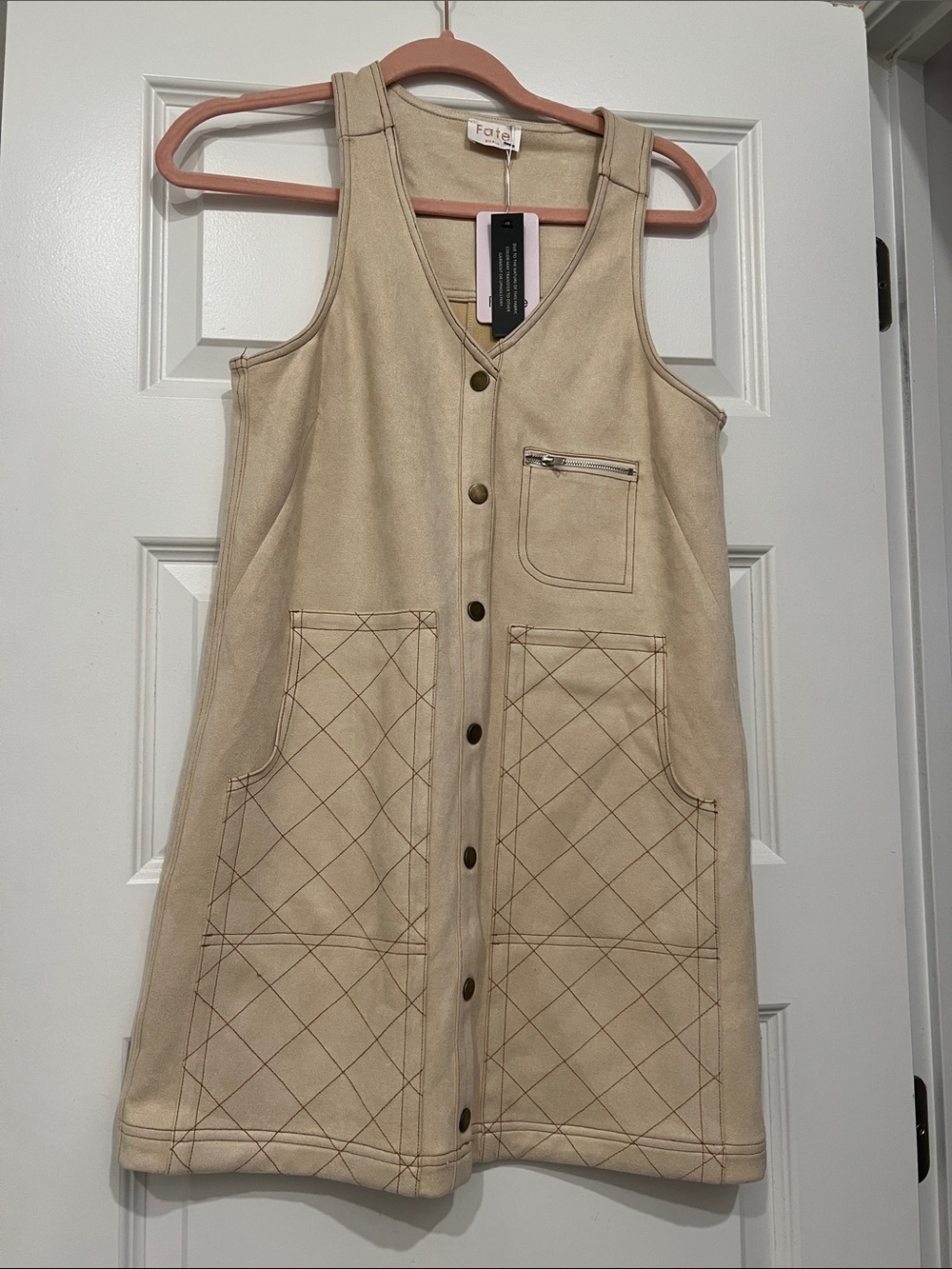 Fate Quilted Pocket Sleeveless Mini Dress in Ecru.